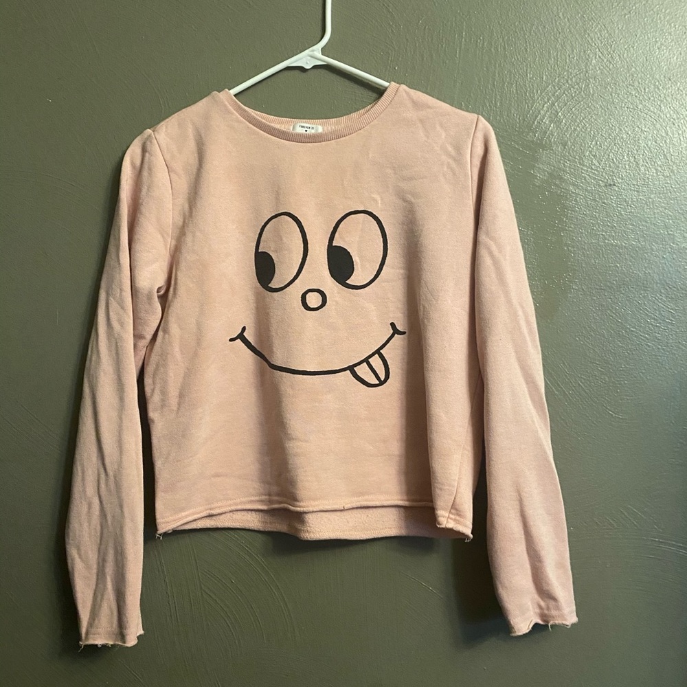 Woman’s pink silly face forever 21 sweatshirt